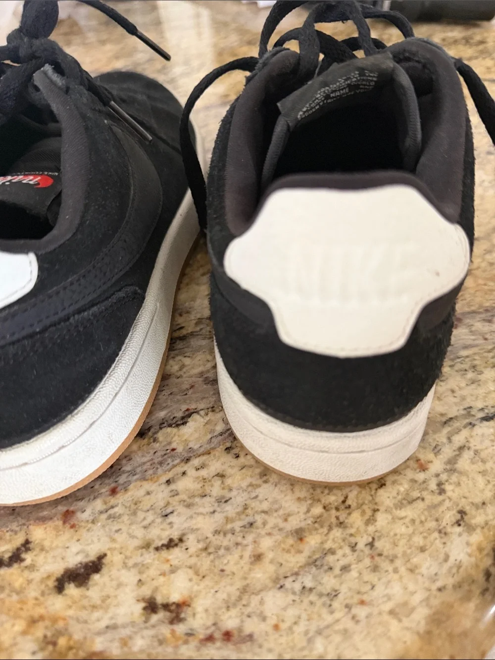 Nike women's Black Suede Low-Top Sneakers with White Sole